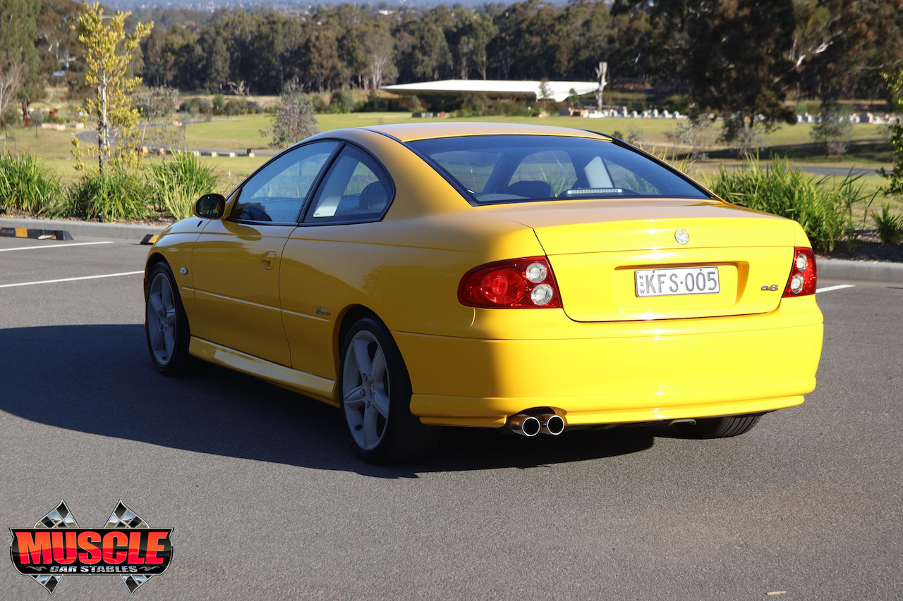 2002 Holden Monaro CV8 Devil Yellow - rear quarter