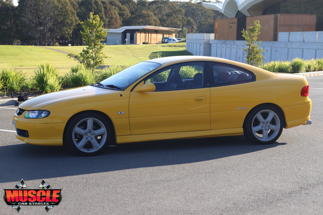 2002 Holden Monaro CV8 Devil Yellow - passenger side